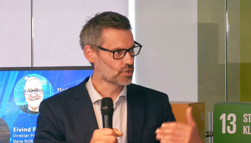 Sigmund Aandstad under paneldebatten om digital transformasjon i byggebransjen.